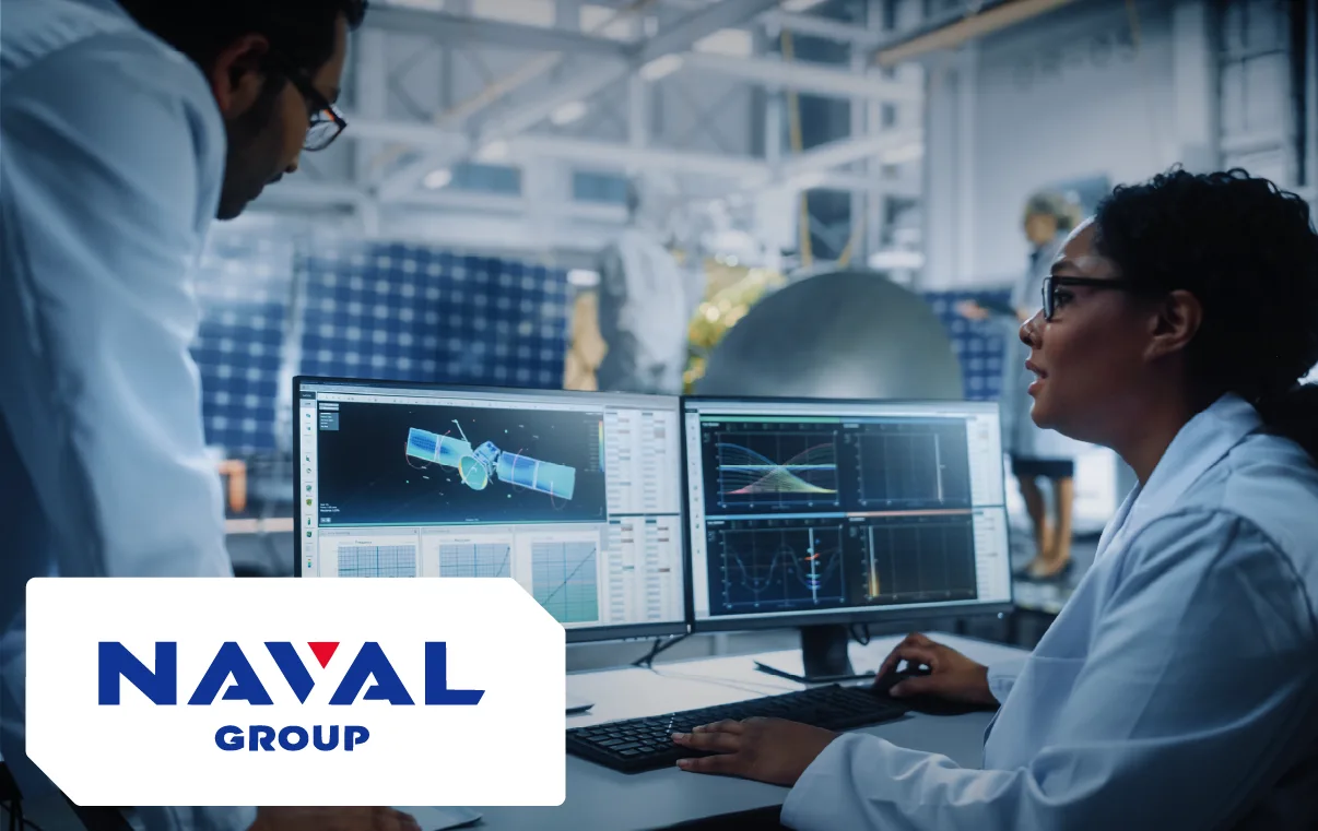Naval Group logo on an image depicting two people working in front of computers.